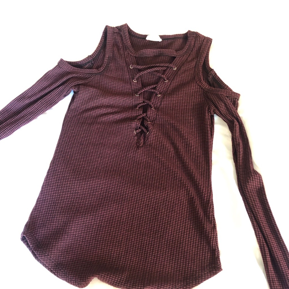 Lace up top with shoulder cut out